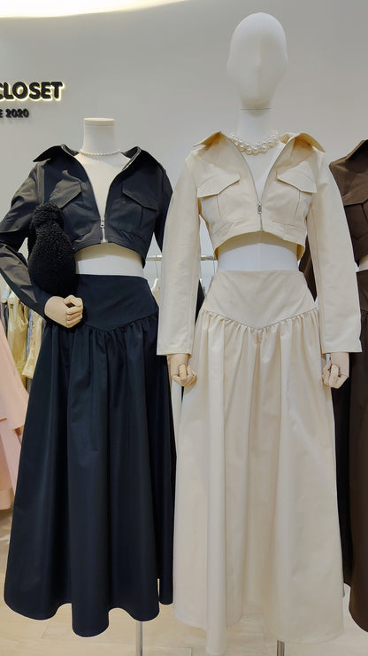 The "Classic Vest" Co-ord Set in black and cream, featuring a zip-front cropped vest and long skirt.