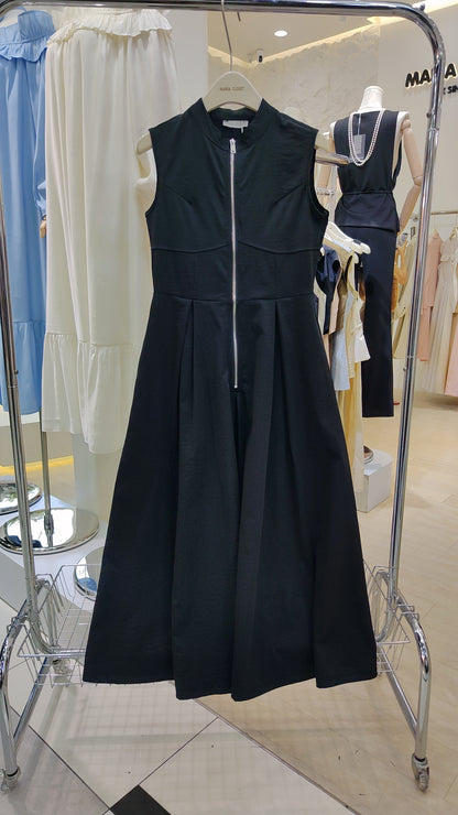 The "Urban Zip-Front" Maxi Dress in black with sleeveless design and full-length front zipper on display.